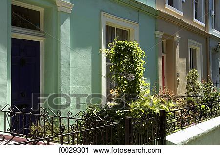 Stock Image - England, London, Nothing Hill, Portobello road, facades of houses. Fotosearch