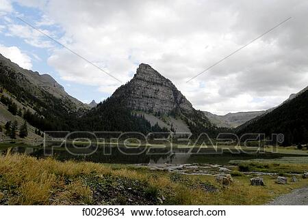 France, Alps, Ubaye Valley, Sagnes tower and Sagnes lake View Large Photo Image Picture - France, Alps, Ubaye Valley, Sagnes tower and Sagnes lake. Fotosearch