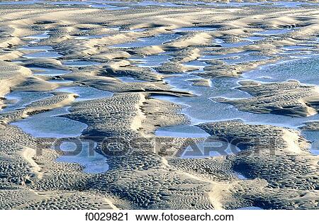 France, Normandy, low tide, sand and water View Large Photo Image Stock Image - France, Normandy, low tide, sand and water. Fotosearch