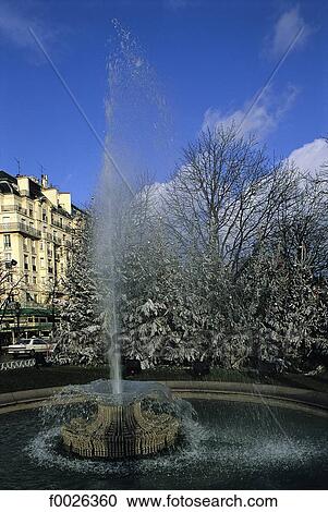 Stock Image - France, Paris, fountain in winter. Fotosearch