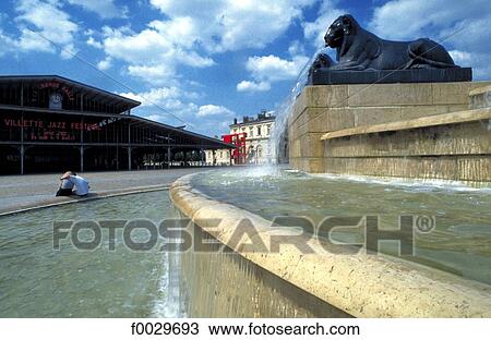 Stock Image - France, Paris, grande Halle de la Villette, fountain. Fotosearch