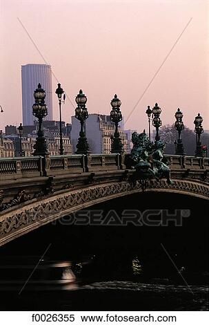 France, Paris, pont Alexandre III and the Montparnasse Tower in the distance View Large Photo Image Stock Photography - France, Paris, pont Alexandre III and the Montparnasse Tower in the distance. Fotosearch
