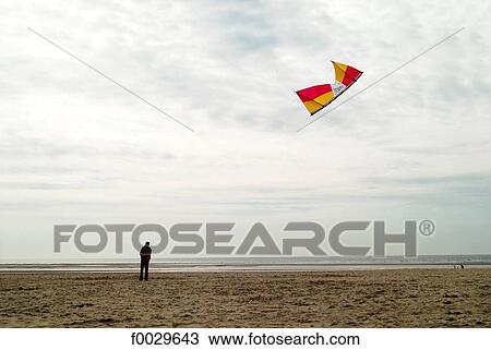 France, Pas-de-Calais, Berck, beach, playing kite View Large Photo Image Stock Image - France, Pas-de-Calais, Berck, beach, playing kite. Fotosearch