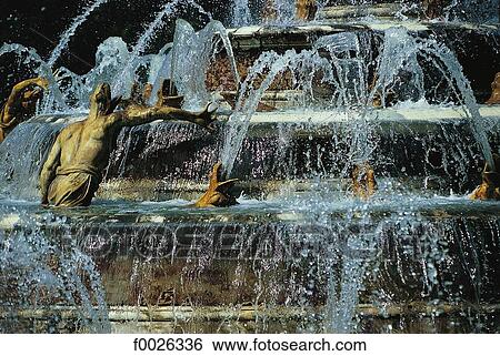 Stock Photograph - France, Versailles, close-up of a fountain in the castle park. Fotosearch