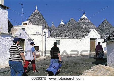 Italy, Apulia, Alberobello, traditional dwellings called "Trullo" View Large Photo Image Stock Photography - Italy, Apulia, Alberobello, traditional dwellings called "Trullo". Fotosearch