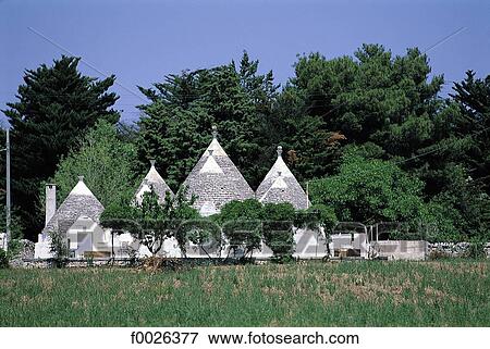 Italy, Apulia, near Alberobello, traditional dwellings called "Trullo" View Large Photo Image Stock Photo - Italy, Apulia, near Alberobello, traditional dwellings called "Trullo". Fotosearch