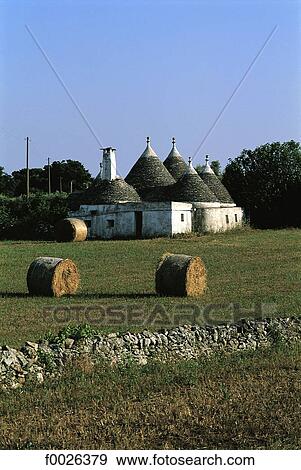 Italy, Apulia, near Alberobello, traditional dwellings called "Trullo" View Large Photo Image Stock Photo - Italy, Apulia, near Alberobello, traditional dwellings called "Trullo". Fotosearch