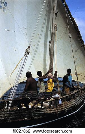 Stock Image - Kenya, Lamu, fishermen on a dhow. Fotosearch