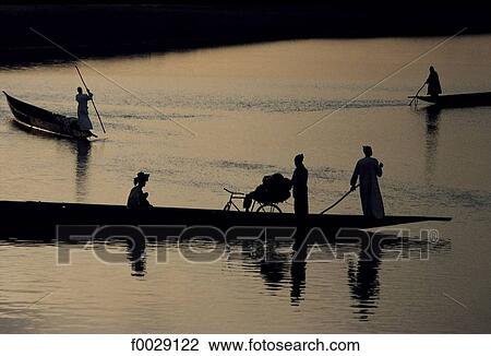 Mali, Djenné, pirogues on Bani River View Large Photo Image Stock Image - Mali, Djenné, pirogues on Bani River. Fotosearch