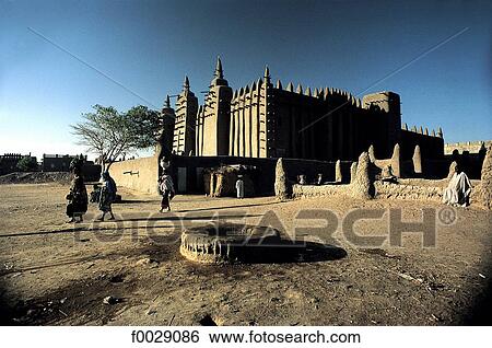 Mali, Djenné, well and mosque View Large Photo Image Stock Photograph - Mali, Djenné, well and mosque. Fotosearch