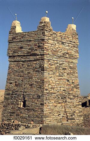 Stock Image - Mauritania, Chinguetti, mosque, minaret. Fotosearch