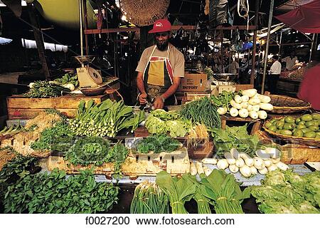 Stock Image - Mauritius, Port-Louis, market, vegetables stall. Fotosearch