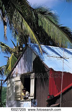 Stock Photography - Mauritius, Rodrigues, Port-Mathurin, local corrugated house. Fotosearch