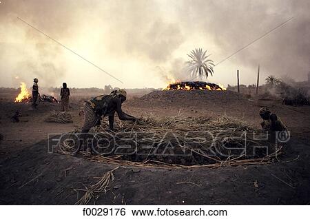 Niger, Myrriah, baking "canari" pottery View Large Photo Image Stock Photograph - Niger, Myrriah, baking "canari" pottery. Fotosearch