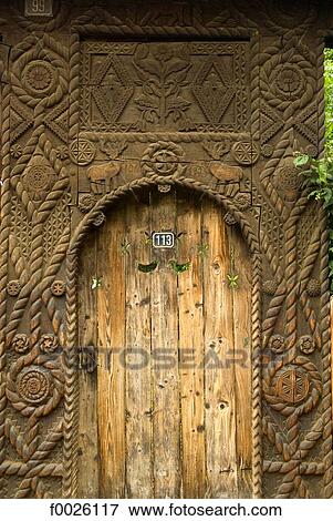 Romania, Maramures, close-up of carved door View Large Photo Image Stock Photo - Romania, Maramures, close-up of carved door. Fotosearch