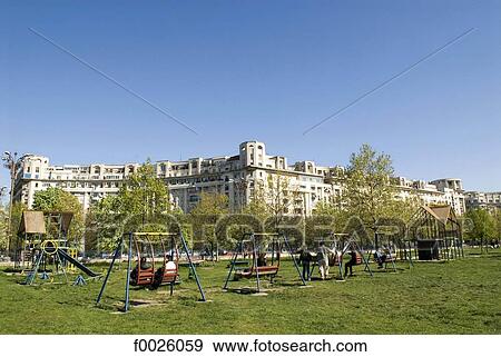 Stock Photo - Romania, Muntenia, Bucharest, park along the Libertatii Boulevard. Fotosearch