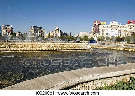 Stock Image - Romania, Muntenia, Bucharest, Unirii Square, fountain. Fotosearch