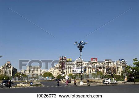 Stock Image - Romania, Muntenia, Bucharest, Unirii Square, Palace of the Parliament in the distance. Fotosearch