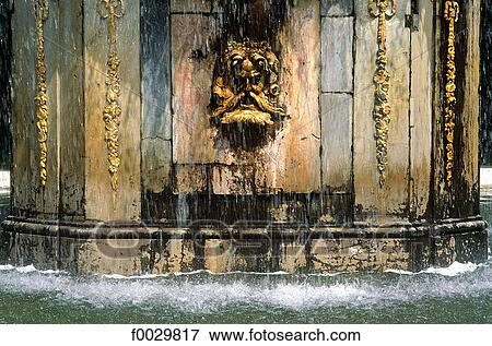 Russia, near Saint Petersburg, Peterhof palace, detail of a fountain View Large Photo Image Stock Photo - Russia, near Saint Petersburg, Peterhof palace, detail of a fountain. Fotosearch