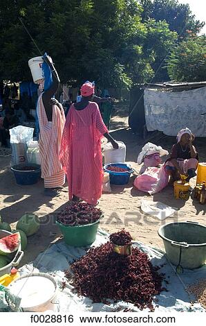 Stock Photograph - Senegal, bush market, bissap on sale. Fotosearch