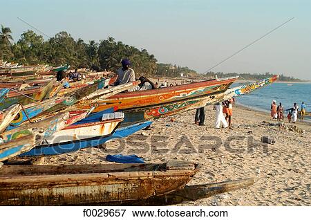 Senegal, M'bour, painted fishing boats View Large Photo Image Stock Photo - Senegal, M'bour, painted fishing boats. Fotosearch