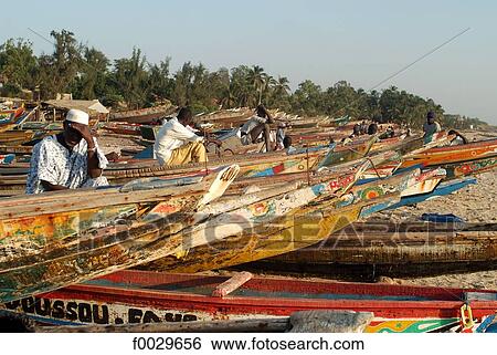 Senegal, M'bour, painted fishing boats View Large Photo Image Stock Photograph - Senegal, M'bour, painted fishing boats. Fotosearch