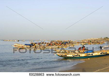 Senegal, Petite côte, near M'bour, fishing boats View Large Photo Image Stock Image - Senegal, Petite côte, near M'bour, fishing boats. Fotosearch
