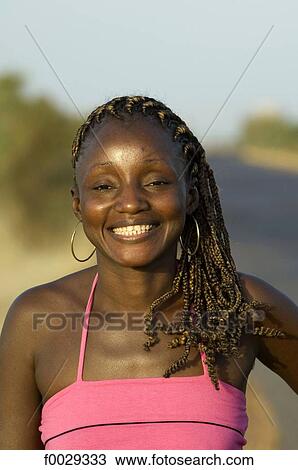 Stock Image - Senegal, portrait of a young woman. Fotosearch
