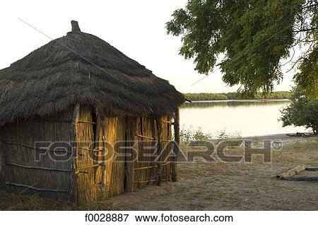 Senegal, Saloum delta, Sine Saloum, traditional dwelling View Large Photo Image Stock Photo - Senegal, Saloum delta, Sine Saloum, traditional dwelling. Fotosearch