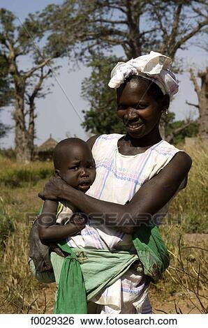 Senegal, Saloum delta, Sine Saloum, woman and his child View Large Photo Image Stock Photograph - Senegal, Saloum delta, Sine Saloum, woman and his child. Fotosearch
