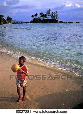 Seychelles, Mahé, children on the beach View Large Photo Image Stock Image - Seychelles, Mahé, children on the beach. Fotosearch