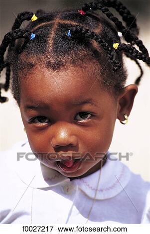 Seychelles, portrait of a young girl View Large Photo Image Stock Photo - Seychelles, portrait of a young girl. Fotosearch