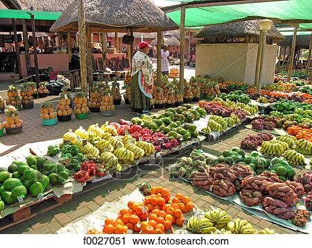 Stock Image - South Africa, Zululand, Zamimpilo, fruits and vegetables for sale at the market . Fotosearch