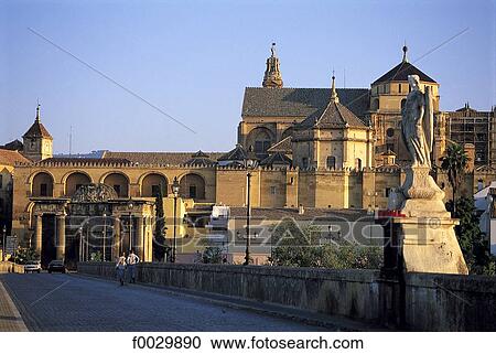 Stock Image - Spain, Andalusia, Cordoba, Guadalquivir River Roman bridge and Great mosque. Fotosearch