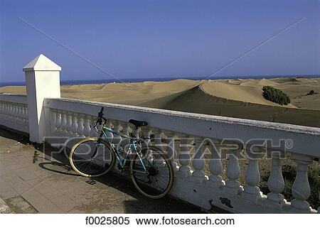 Spain, Canary Islands, Gran Canaria, Maspalomas, bike View Large Photo Image Stock Photography - Spain, Canary Islands, Gran Canaria, Maspalomas, bike. Fotosearch