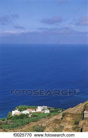 Spain, Canary Islands, La Gomera, Agulo and Tenerife in the distance View Large Photo Image Stock Image - Spain, Canary Islands, La Gomera, Agulo and Tenerife in the distance. Fotosearch