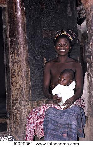 Togo, Bassar woman and her child View Large Photo Image Stock Image - Togo, Bassar woman and her child. Fotosearch