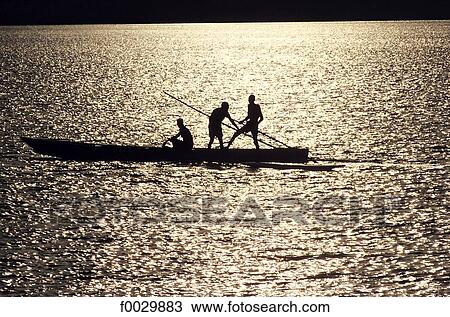 Togo, lake Togo, fishermen at sunset View Large Photo Image Stock Image - Togo, lake Togo, fishermen at sunset. Fotosearch