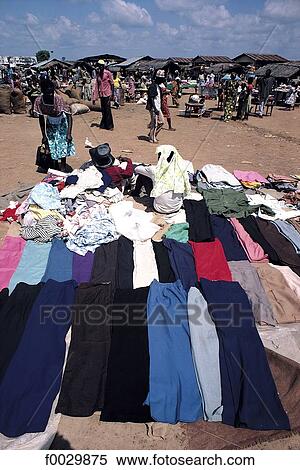 Togo, Tchamba, market, clothes on sale View Large Photo Image Stock Photography - Togo, Tchamba, market, clothes on sale. Fotosearch