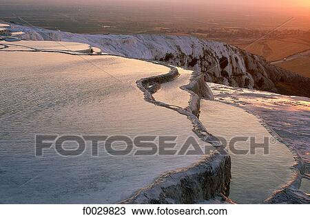 Stock Image - Turkey, Pamukkale, hot springs, terraced natural pools. Fotosearch