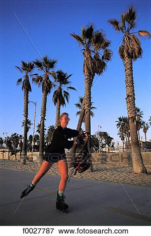 United States, California, Los Angeles, Venice, roller skating along the beach walkway View Large Photo Image Stock Photo - United States, California, Los Angeles, Venice, roller skating along the beach walkway. Fotosearch