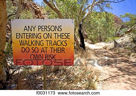 Stock Image - Australia, Northern Territory, near Standley chasm, danger sign. Fotosearch