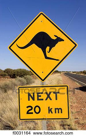 Picture - Australia, Northern Territory, road from Alice Springs to Coober Pedy, kangaroo sign. Fotosearch