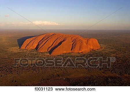 Stock Image - Australia, Northern Territory, Uluru-kata Tjuta national park, Ayers Rock, aerial photography. Fotosearch