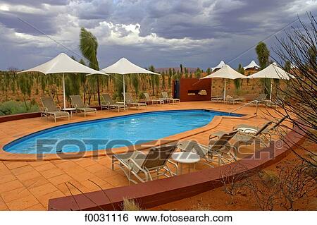 Australia, Northern Territory, Uluru-kata Tjuta national park, swimming pool of a luxury hotel View Large Photo Image Stock Photograph - Australia, Northern Territory, Uluru-kata Tjuta national park, swimming pool of a luxury hotel. Fotosearch