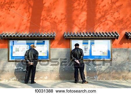 China, Beijing, Beihai park, men reading newspapers View Large Photo Image Stock Photo - China, Beijing, Beihai park, men reading newspapers. Fotosearch