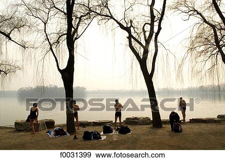 Stock Photo - China, Beijing, Summer Palace "Yiheyan", tourists ready to plunge. Fotosearch