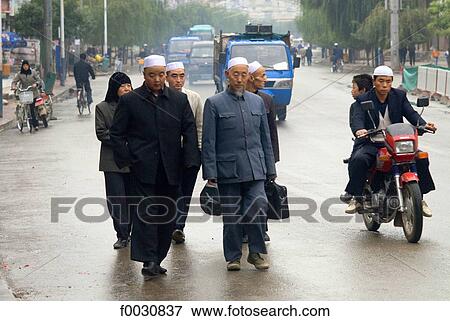 Stock Photo - China, Gansu, Linxia, Hui muslim ethnos men. Fotosearch