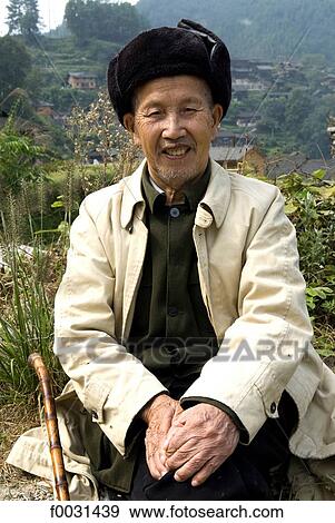 China, Guizhou, Xijiang village, portrait of an old man View Large Photo Image Stock Photo - China, Guizhou, Xijiang village, portrait of an old man. Fotosearch