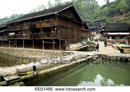 Stock Photograph - China, Guizhou, Zhaoxing village, Dong women in traditional costume. Fotosearch
